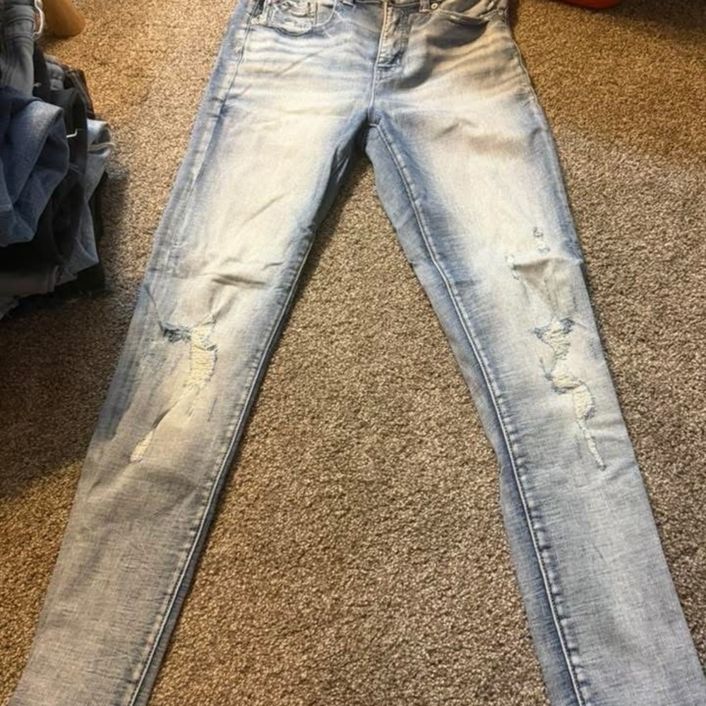 Buckle Light Blue Distressed Skinny Jeans